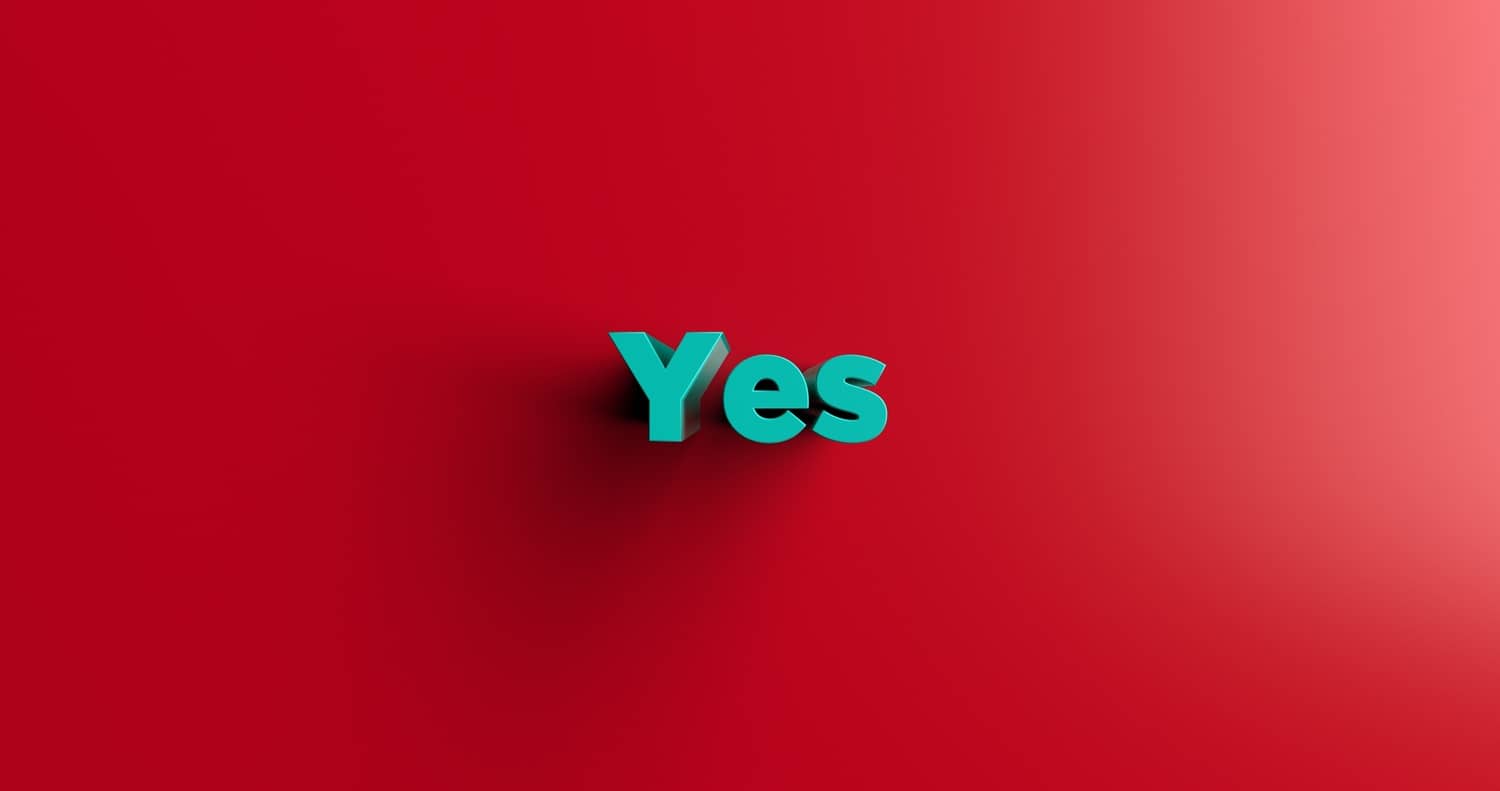 Red Square With The Word Yes Written in Light Blue Color